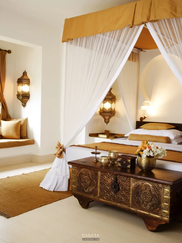 Ảnh đầu giường bọc nệm cong với tab đầu giường tròn do Casara tuyển chọn cho thư viện thiết kế nội thất.