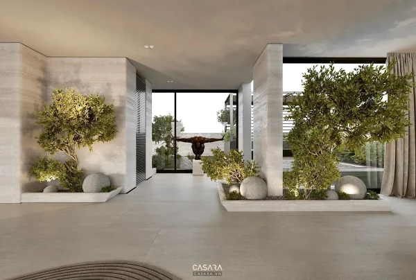 Ảnh vườn trong nhà mở ra sân kính và lối đi lát đá do Casara tuyển chọn cho thư viện thiết kế nội thất.