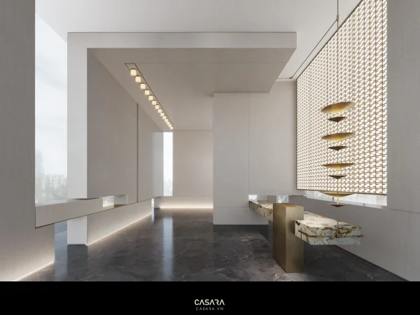 Ảnh kệ trang trí lối vào với tranh treo và bình hoa nhỏ do Casara tuyển chọn cho thư viện thiết kế nội thất.