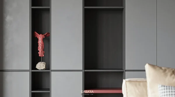 Ảnh vách tủ trang trí màu đen với kệ âm và gương tròn do Casara tuyển chọn cho thư viện thiết kế nội thất.
