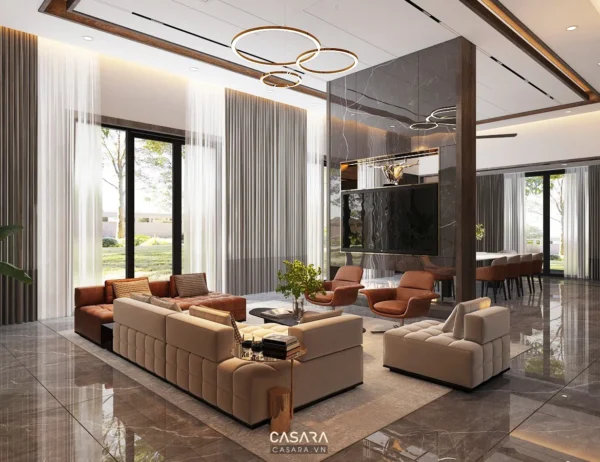 Phòng khách hiện đại với sofa trắng, kệ tivi gỗ và khoảng sân vườn bên cạnh