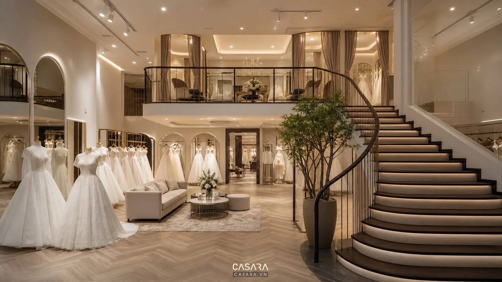 showroom áo cưới 2 tầng với cầu thang, váy cưới trưng bày và khu thử váy riêng tư