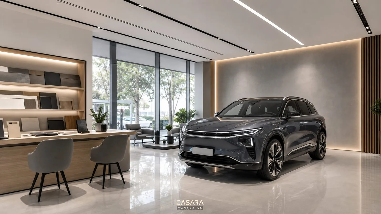 Showroom VinFast có xe VinFast, đèn trần, sàn sáng và vách logo