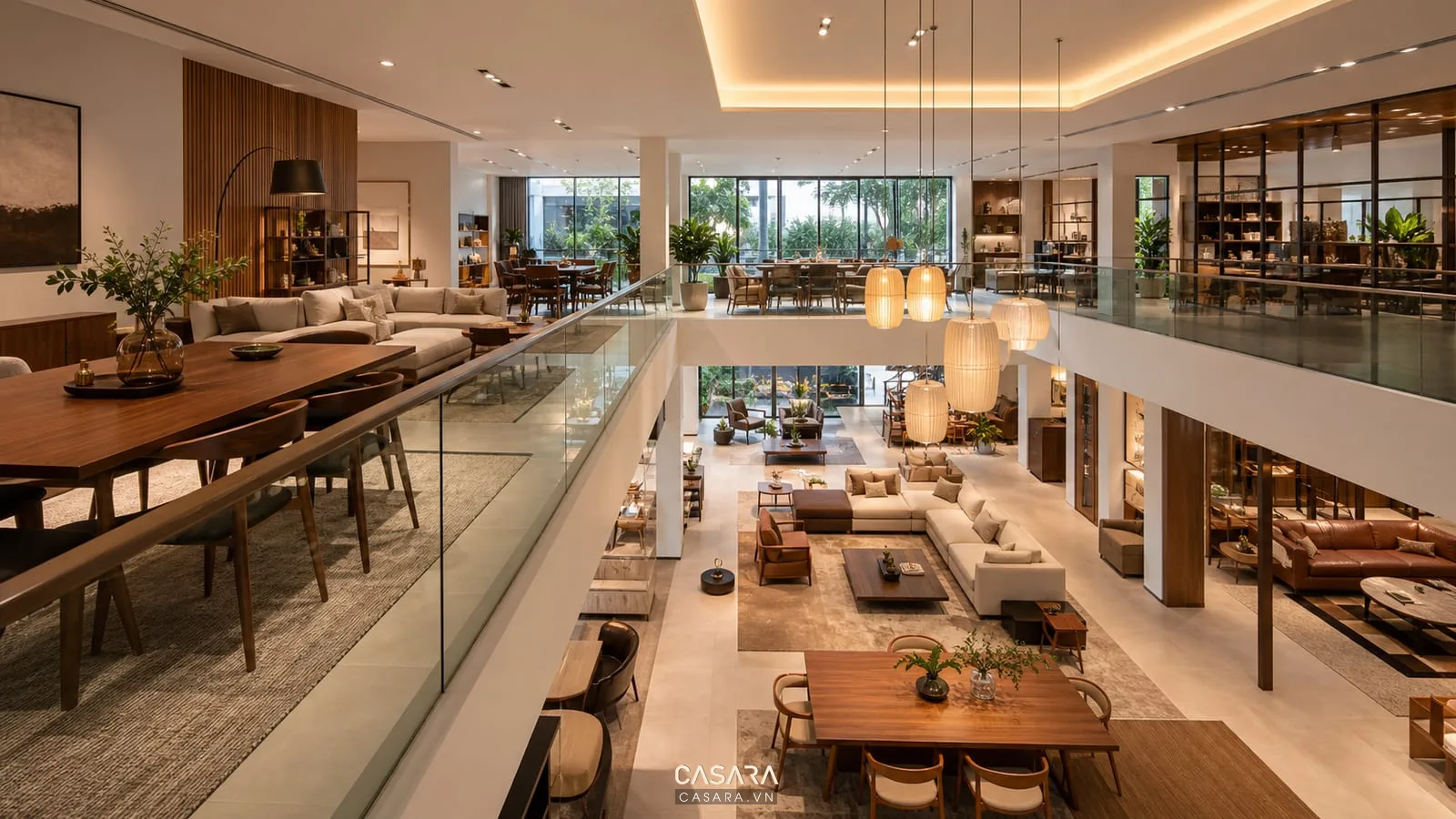 showroom 2 tầng nội thất khoảng thông tầng đèn thả lan can kính khu bàn ăn sofa nhìn từ tầng hai