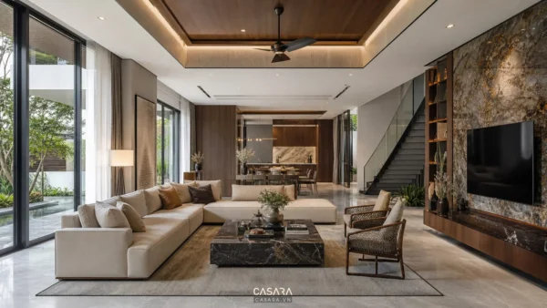 Phòng khách biệt thự hiện đại với sofa lớn và vách ốp sang trọng