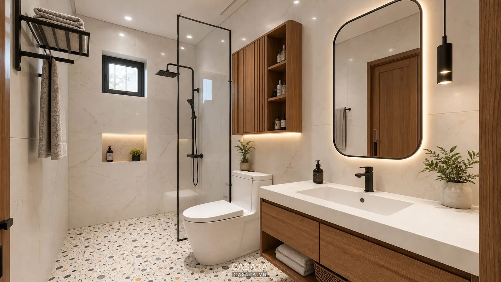Thiết kế phòng vệ sinh 6m2 với gạch terrazzo sáng tường gạch vân đá nhẹ tủ lavabo màu gỗ phụ kiện đen mờ cây xanh nhỏ và đèn ánh sáng ấm