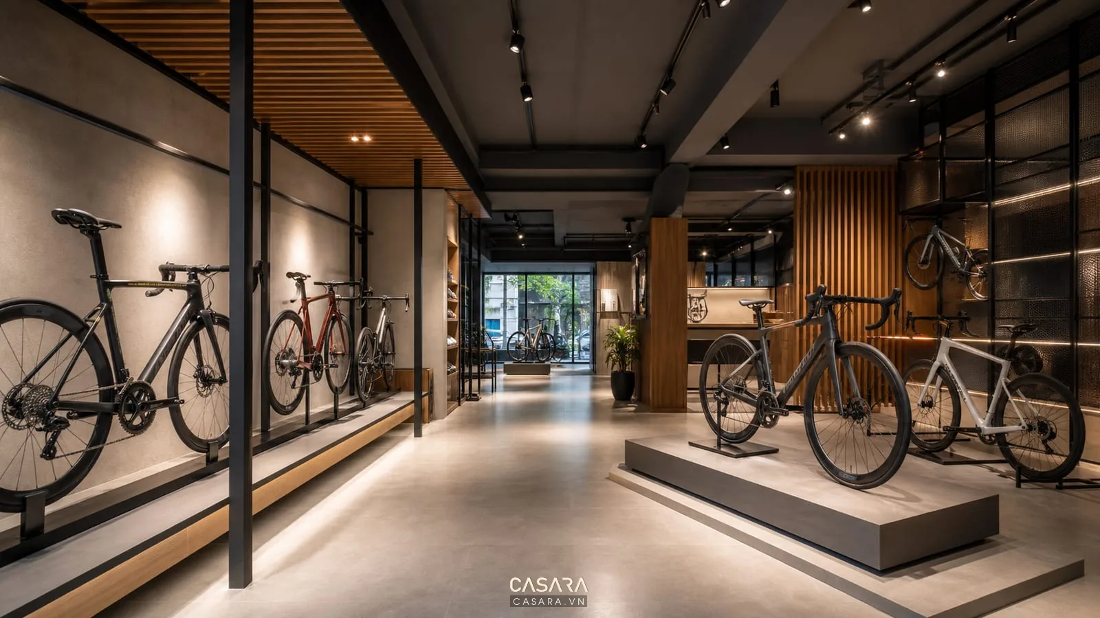 showroom xe đạp có ánh sáng rọi khung xe tường trung tính sàn dễ vệ sinh và vật liệu hiện đại