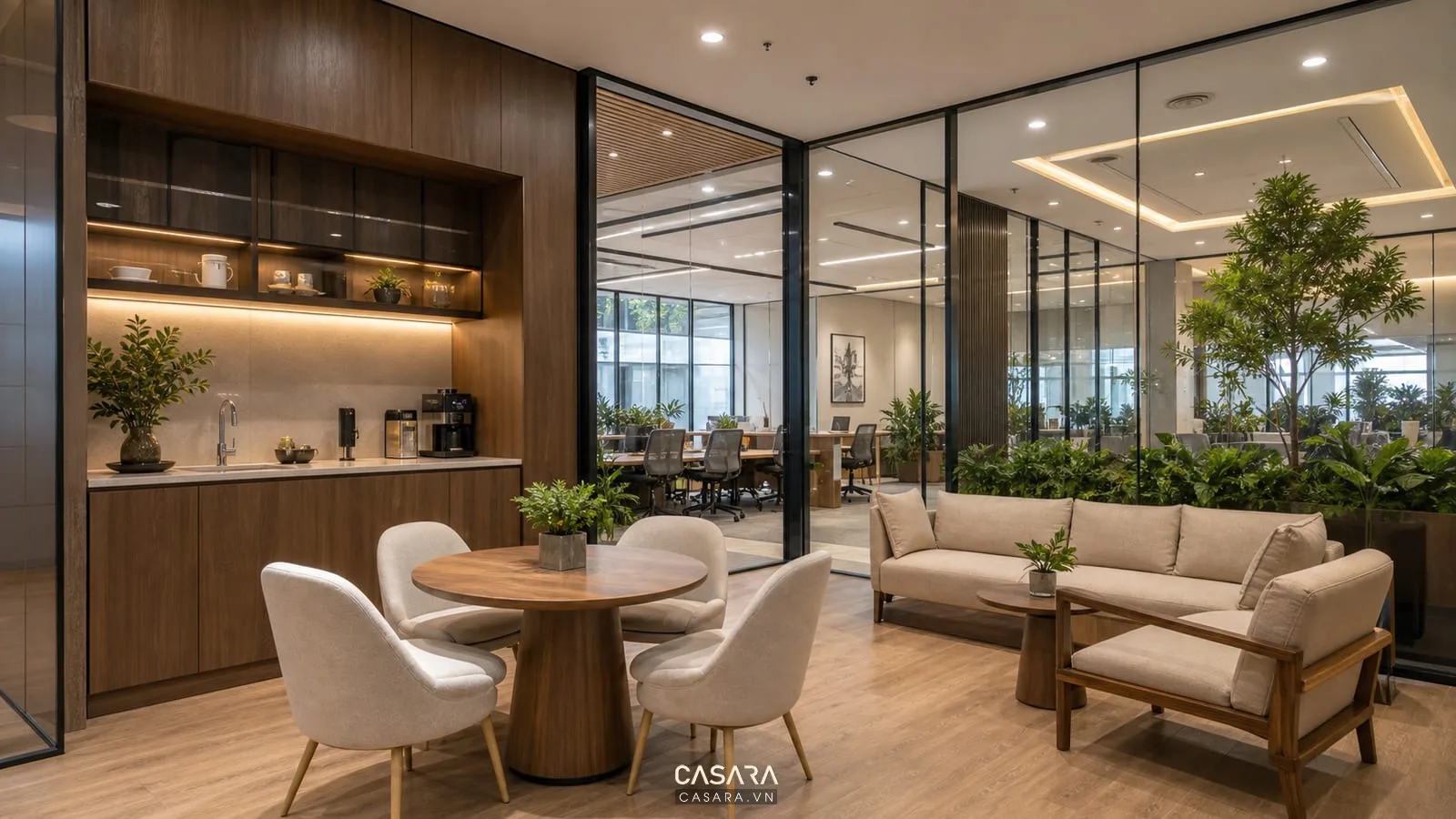 Pantry và lounge trong thiết kế văn phòng 1000m2 với bàn trao đổi, ghế nghỉ và ánh sáng ấm