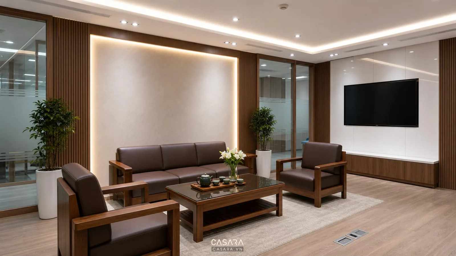 văn phòng tiếp khách với vách logo đèn nhấn và ổ cắm âm sàn