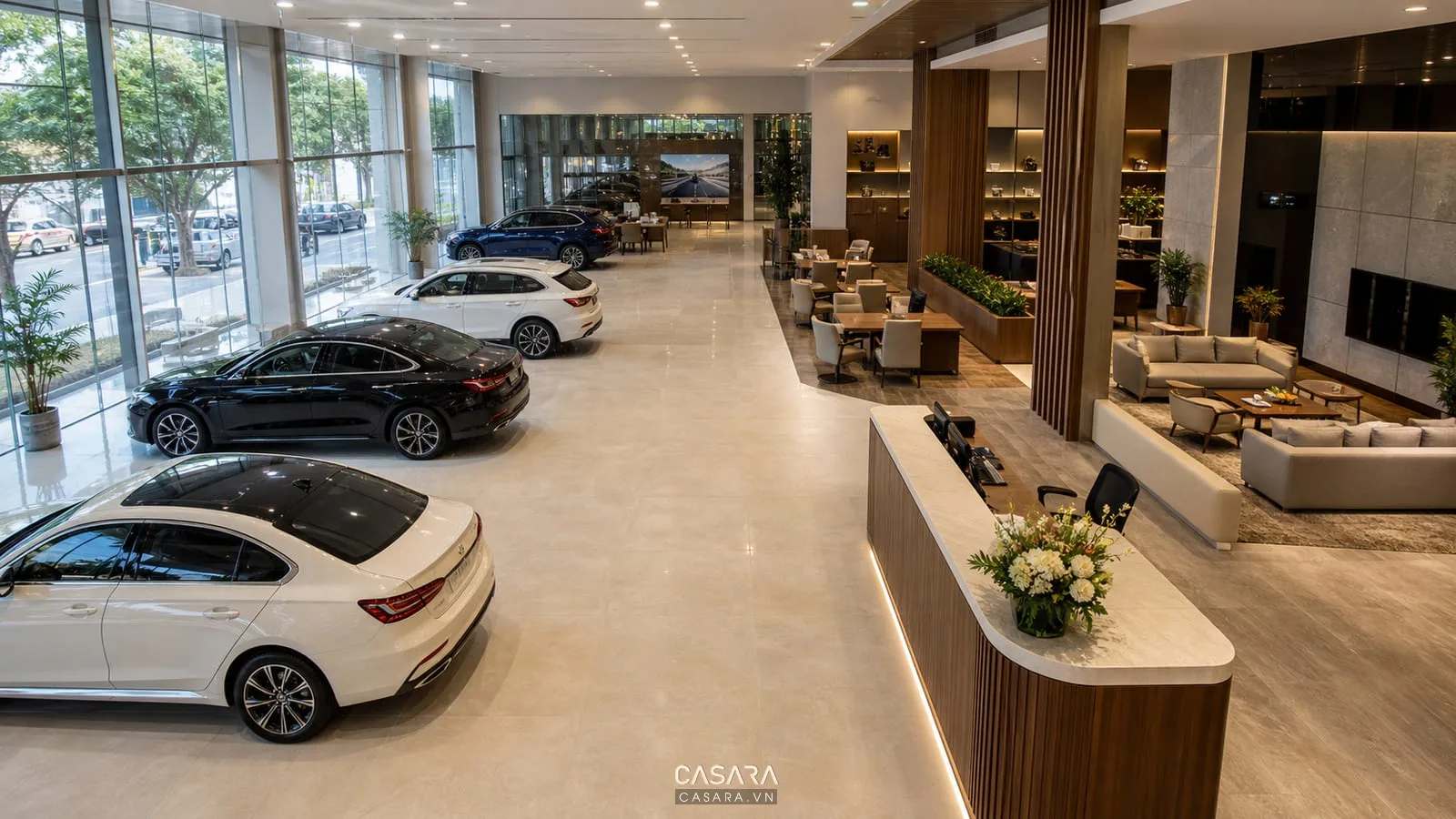 Mặt bằng showroom ô tô với xe trưng bày, quầy lễ tân, khu chờ và bàn tư vấn