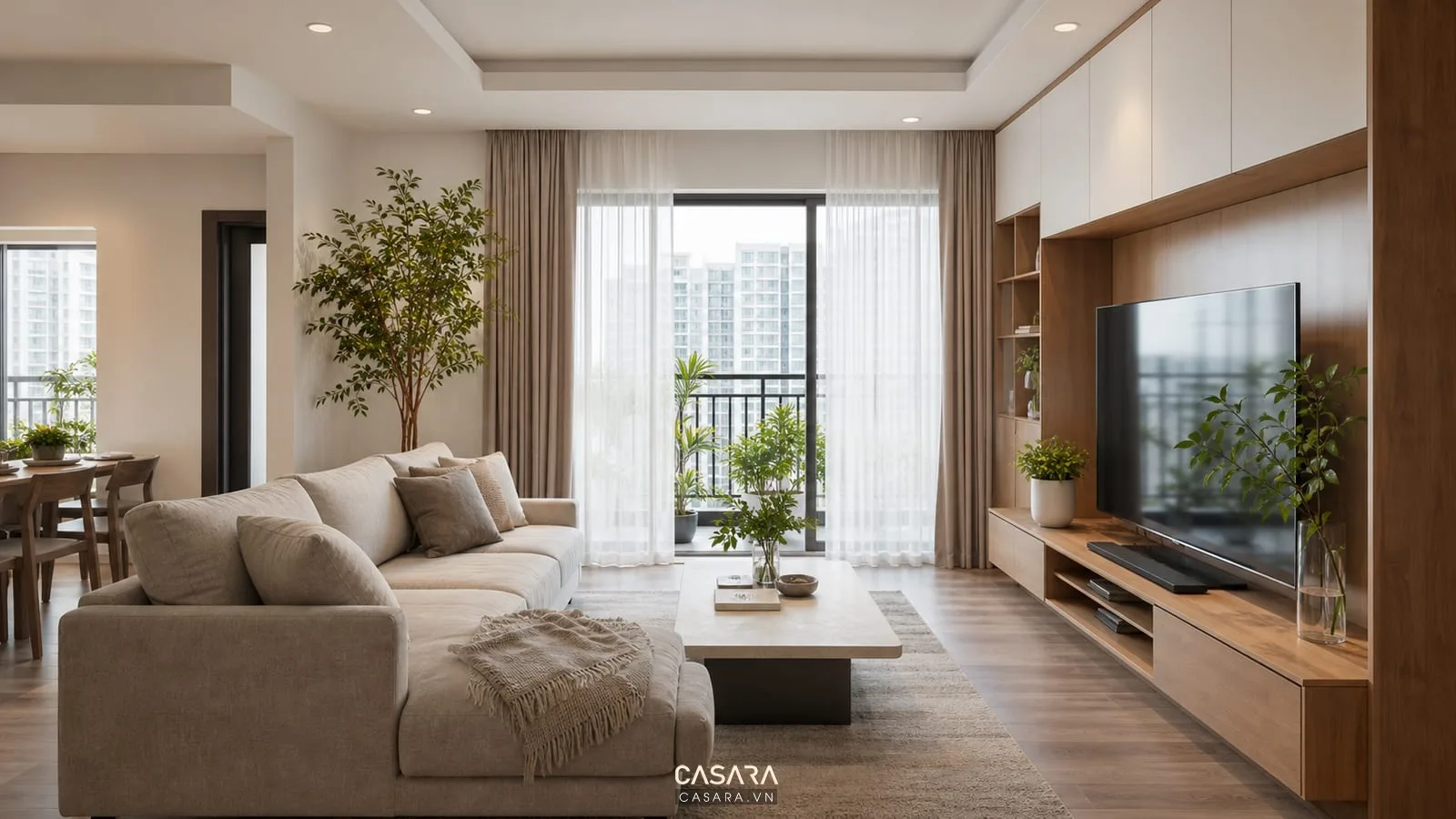 phòng khách căn hộ chung cư đẹp với sofa, kệ tivi và rèm sáng