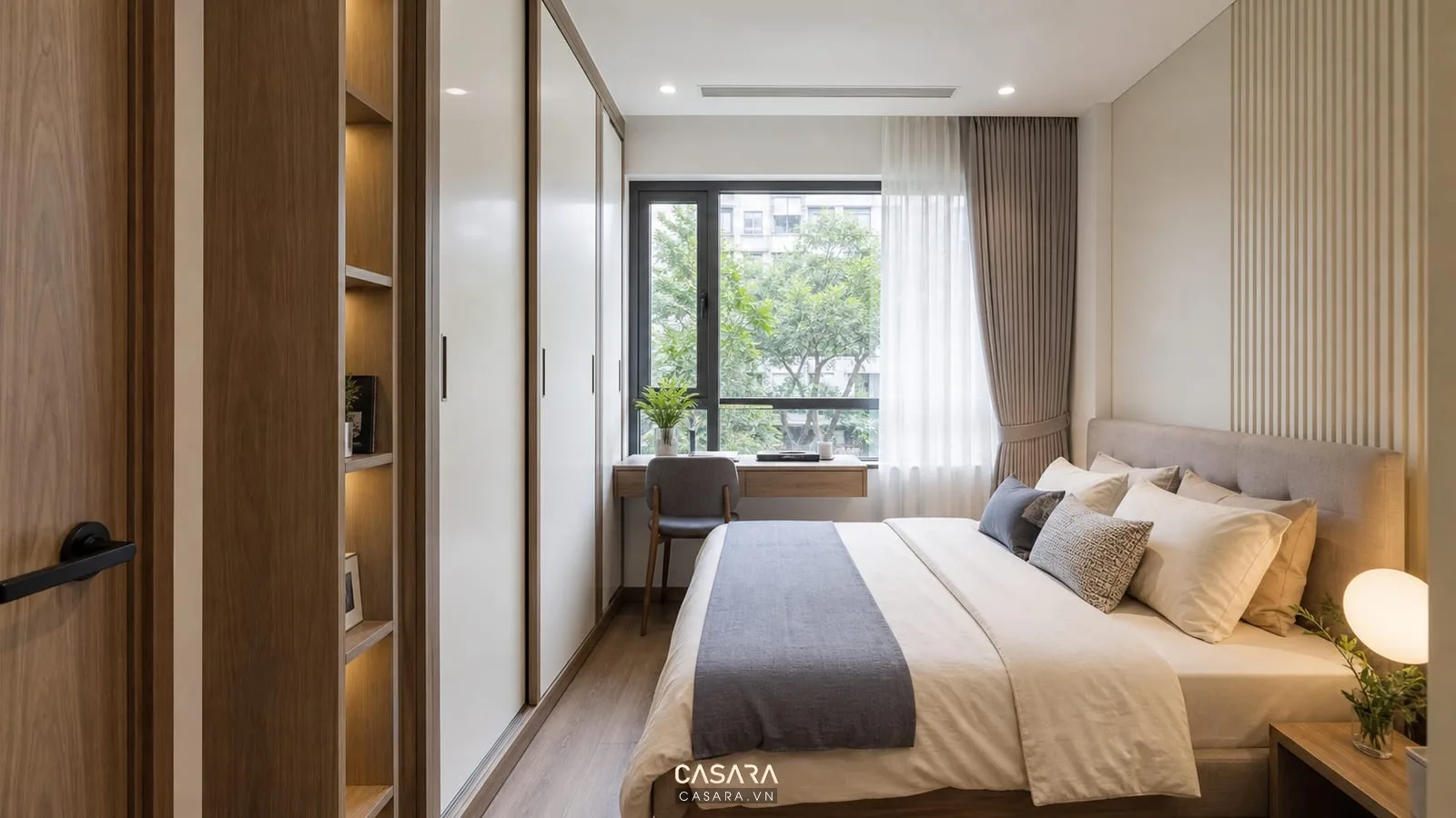 Phòng ngủ trong bản thiết kế chung cư mini với giường đôi và tủ áo cánh lùa