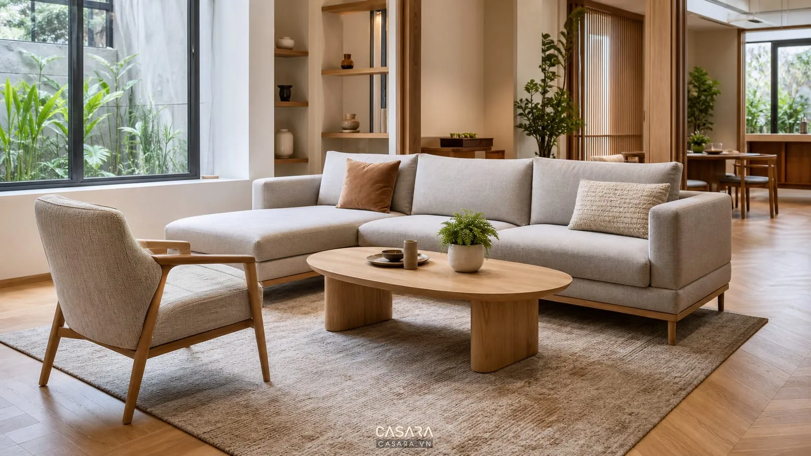 ghế bàn trà phòng khách đẹp với sofa chữ L và bàn trà oval gỗ sáng trong nhà phố hiện đại