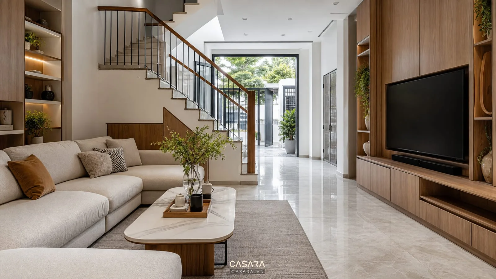 thiết kế nội thất nhà phố đẹp với phòng khách sofa kệ tivi gỗ và cầu thang hiện đại