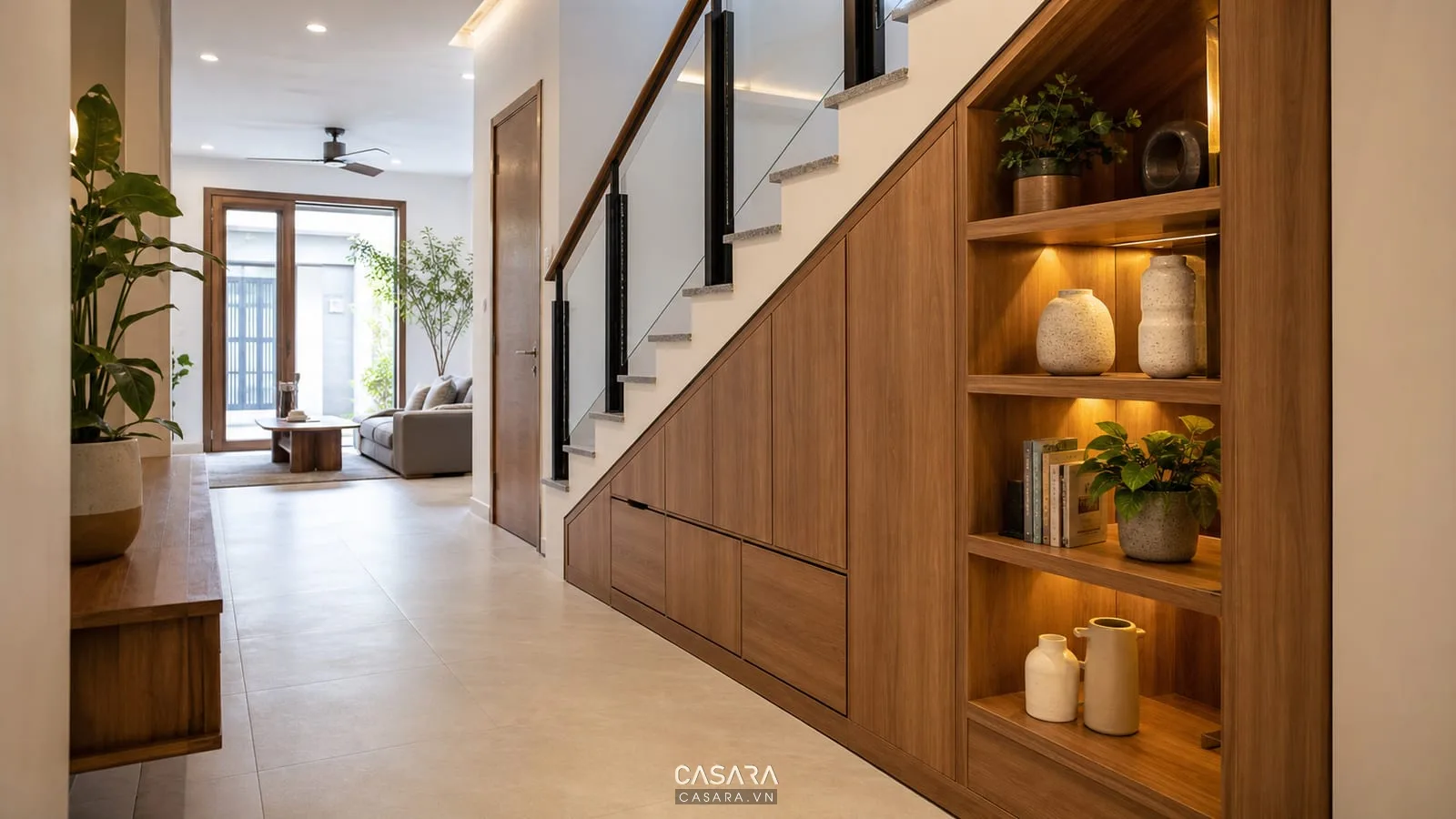 gầm cầu thang nhà ống làm tủ lưu trữ và kệ trang trí gỗ