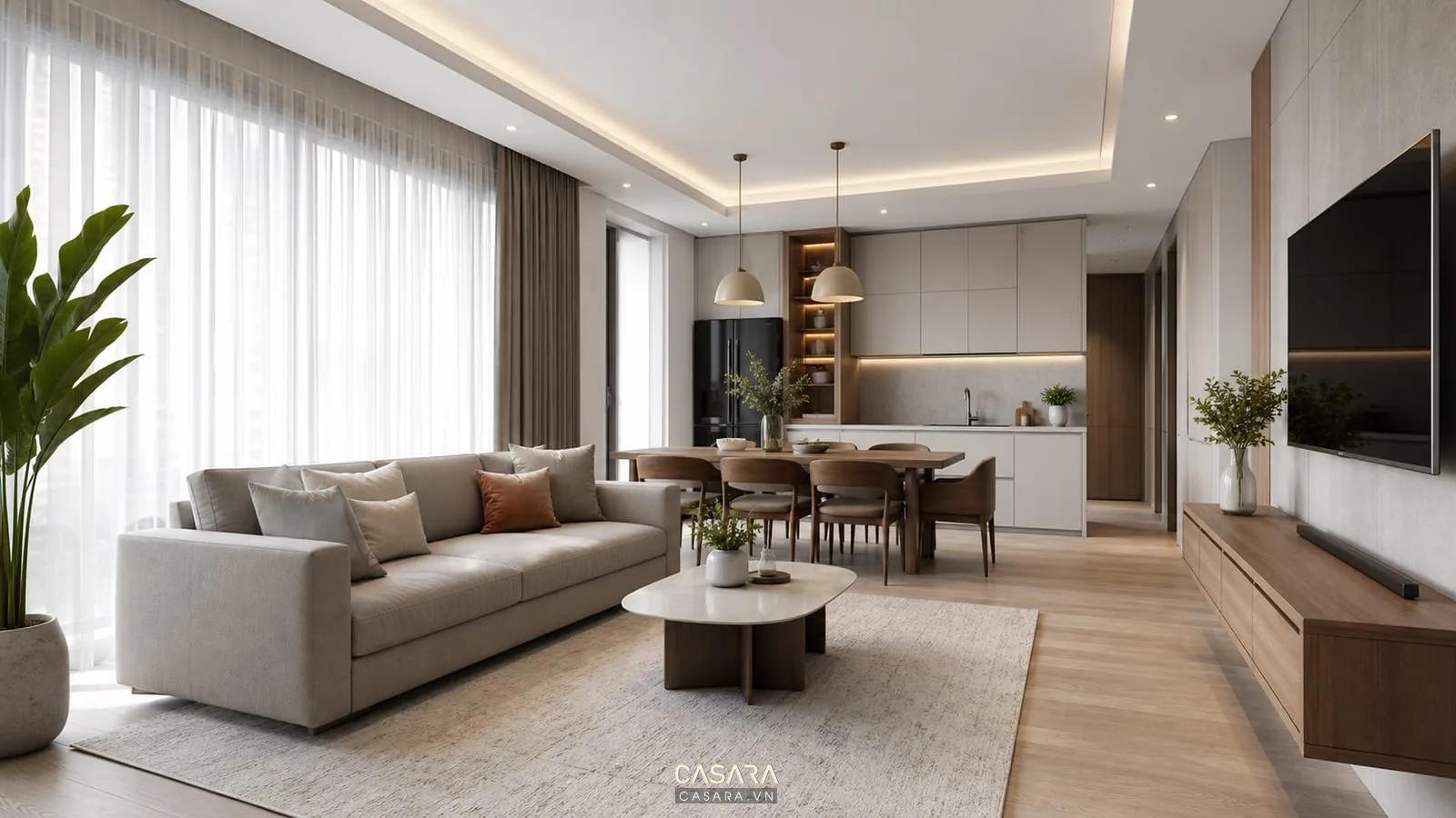 phòng khách chung cư đẹp liền bếp có sofa chữ I bàn trà nhỏ kệ tivi treo và thảm sáng màu