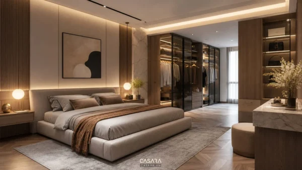 Phòng ngủ căn hộ có giường bọc nệm, tủ quần áo cánh kính và bàn trang điểm cạnh cửa sổ