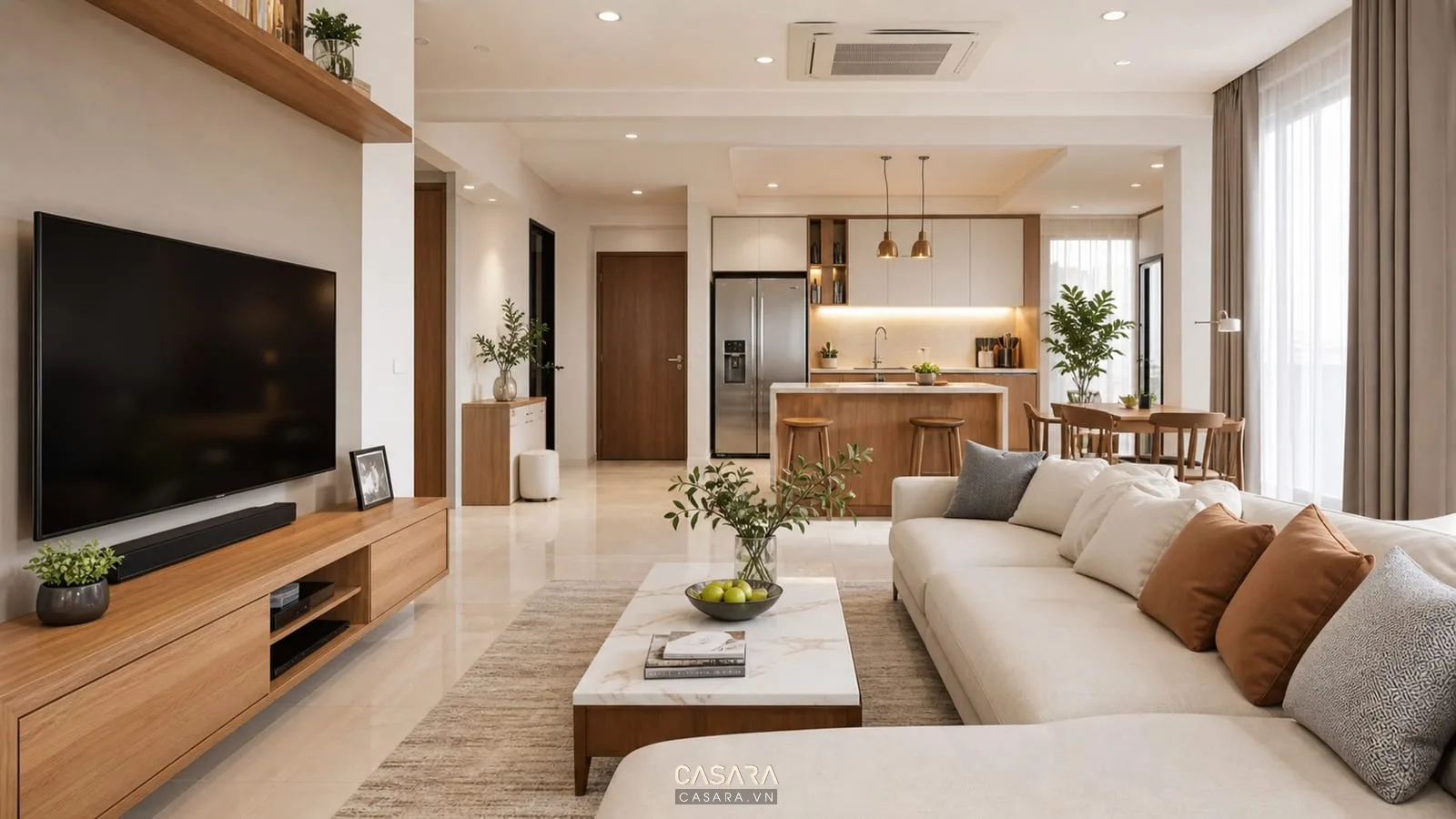 phòng khách liền bếp chung cư với sofa trung tính bàn ăn nhỏ và tủ bếp gỗ