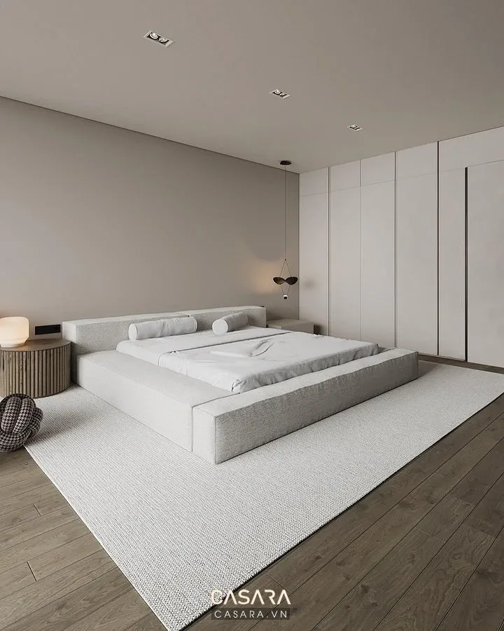 Nội thất chung cư 2 phòng ngủ 70m2 với phòng ngủ có giường gỗ sáng, tường đầu giường ốp gỗ, đèn ngủ ấm, tủ áo âm tường và không gian nghỉ ngơi yên tĩnh