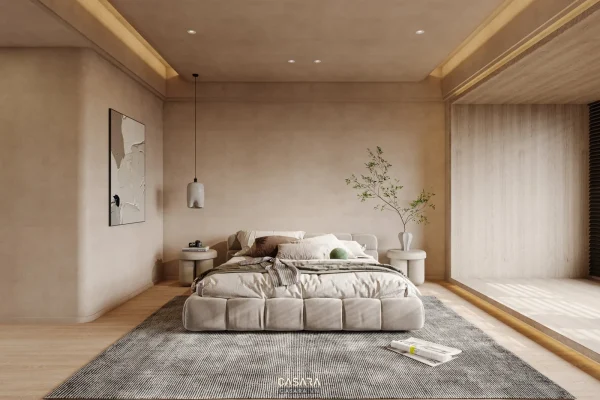 Phòng ngủ hiện đại tông be với giường thấp, thảm lớn và ánh sáng hắt trần