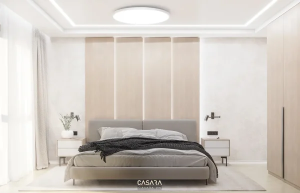 Phòng ngủ hiện đại tông sáng với giường bọc nệm, vách đầu giường ốp gỗ và tủ áo kịch trần