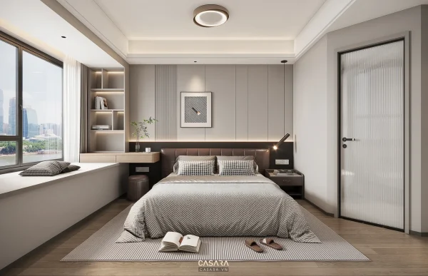 Ảnh phòng ngủ hiện đại có giường thấp, kệ trang trí đầu giường, bàn làm việc nhỏ, cửa sổ lớn và cửa phòng màu xám.