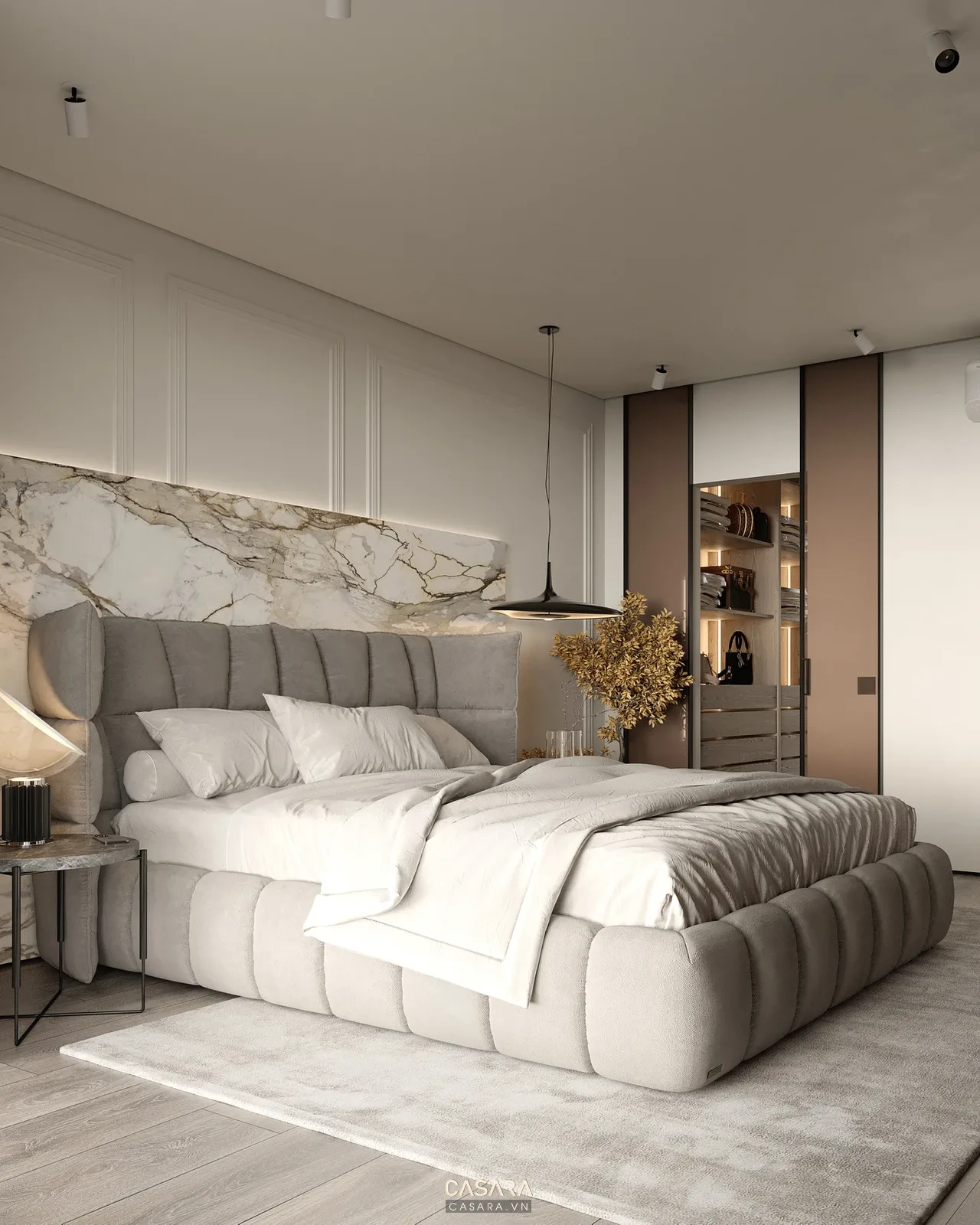 Phòng ngủ chính nhà 50m2 với giường bọc nệm và tủ áo kịch trần