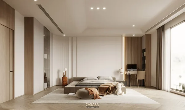 Phòng ngủ hiện đại có giường thấp, hệ tủ âm tường và góc làm việc cạnh cửa kính