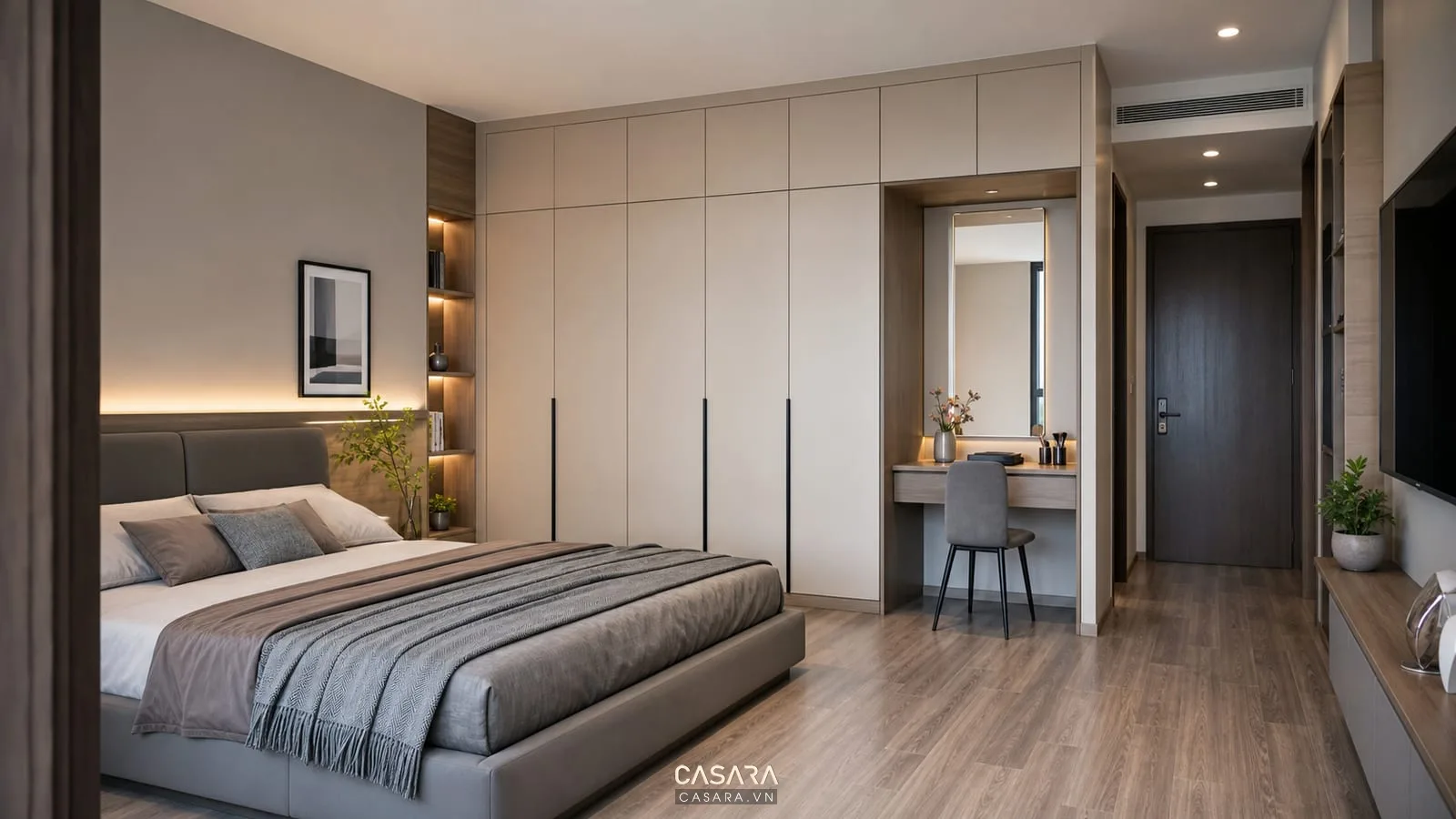 Hệ tủ áo phòng ngủ chung cư kịch trần với giường ngủ thấp, bàn trang điểm nhỏ và lối đi cuối giường