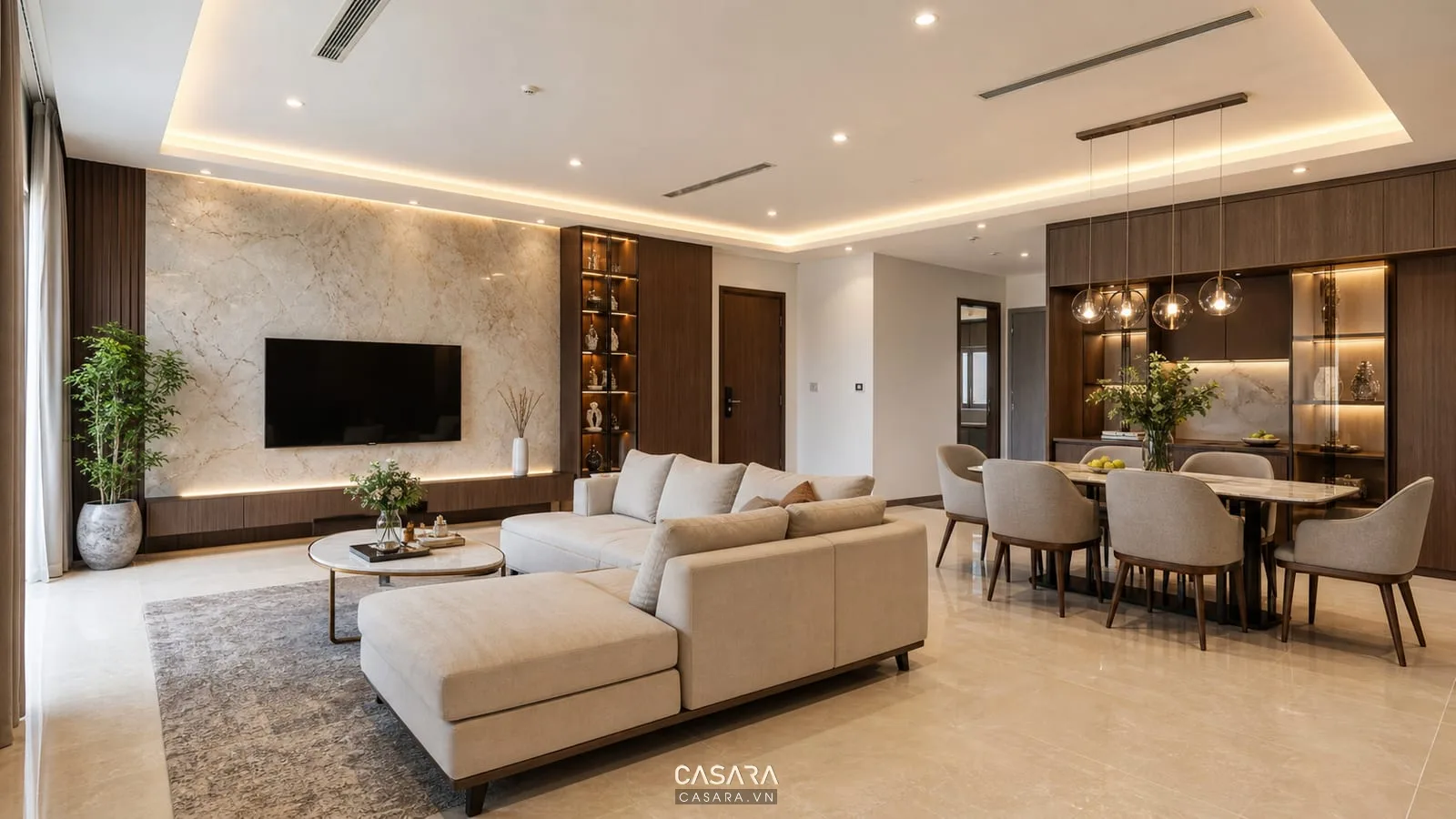 Thiết kế nội thất chung cư 100m2 với phòng khách rộng, sofa chữ L và bàn ăn 6 ghế