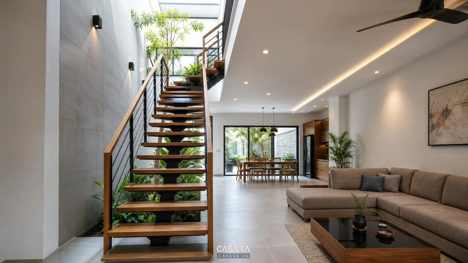 Cầu thang nhà ống xương cá khung thép đen và bậc gỗ trong phòng khách hiện đại