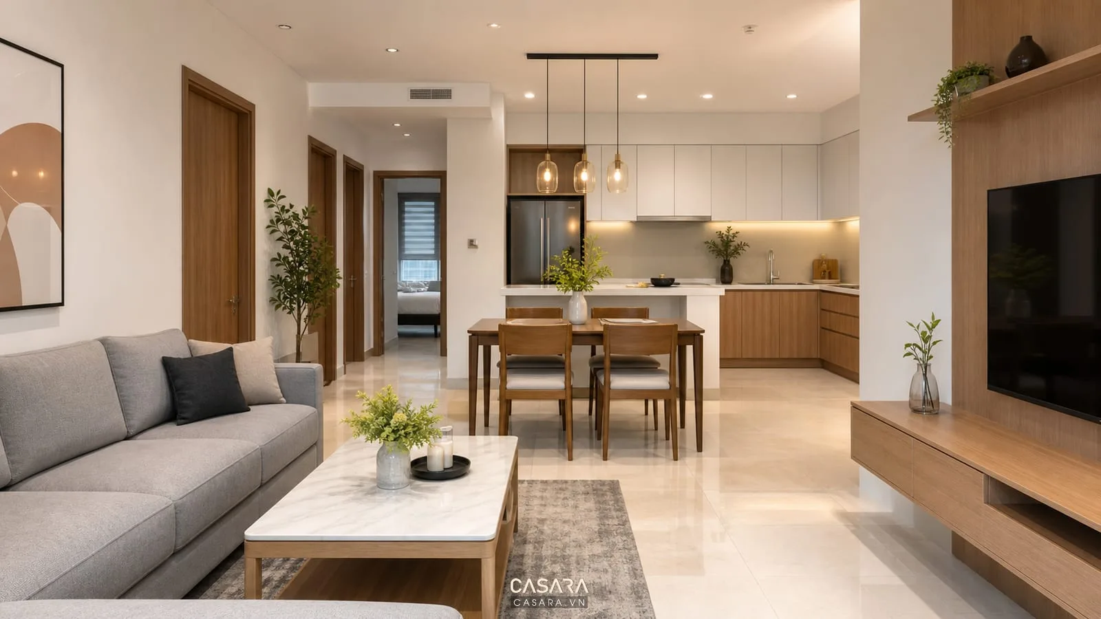 Phòng khách liền bếp trong nhà chung cư 2 phòng ngủ với sofa và bàn ăn 4 ghế
