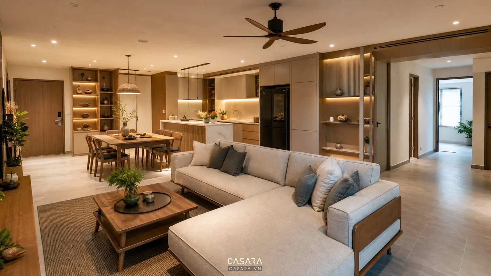 Mẫu thiết kế chung cư 3 phòng ngủ với phòng khách liền bếp, bàn ăn sáu ghế và tủ bếp cao