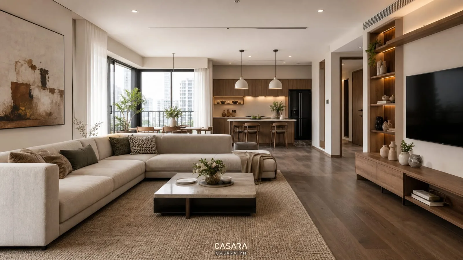 Phòng khách nội thất hiện đại với sofa chữ L, kệ tivi gỗ, bàn trà thấp, ánh sáng tự nhiên và bếp mở phía sau.