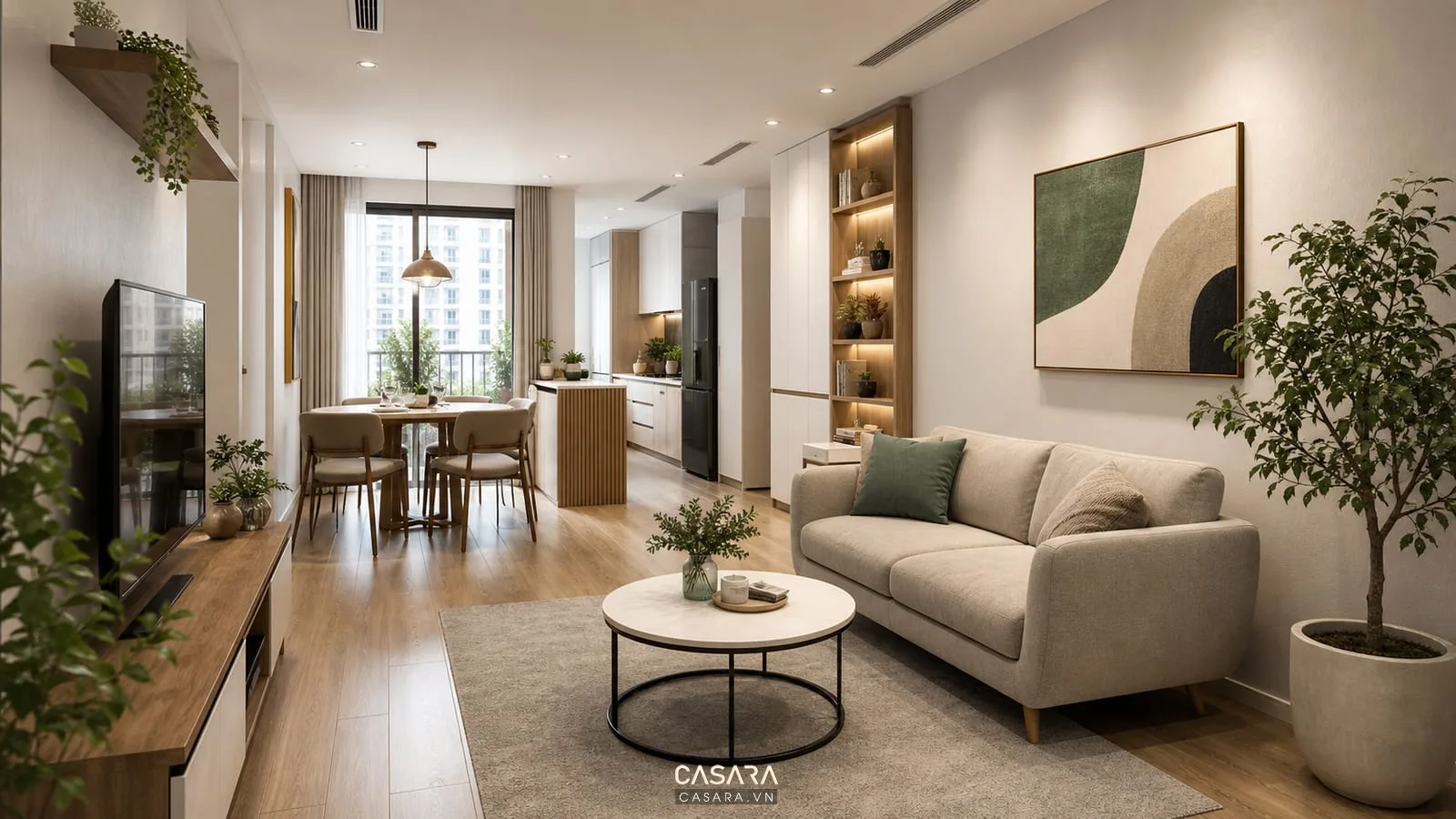 trang trí phòng khách chung cư đẹp với sofa nhỏ kệ tivi thấp và bàn ăn gần bếp