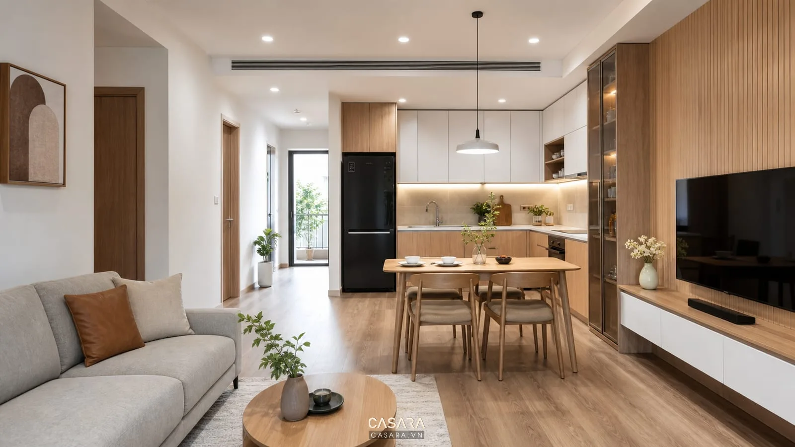 Nội thất nhà chung cư 70m2 với phòng khách liên thông bếp và bàn ăn gỗ