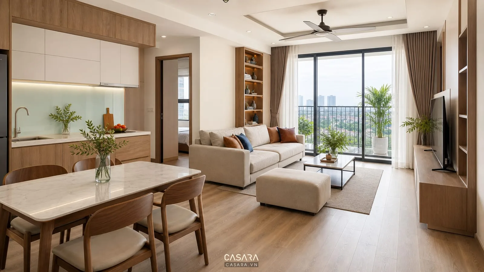 Nội thất chung cư Hà Nội phòng khách liền bếp sáng thoáng với sofa và bàn ăn