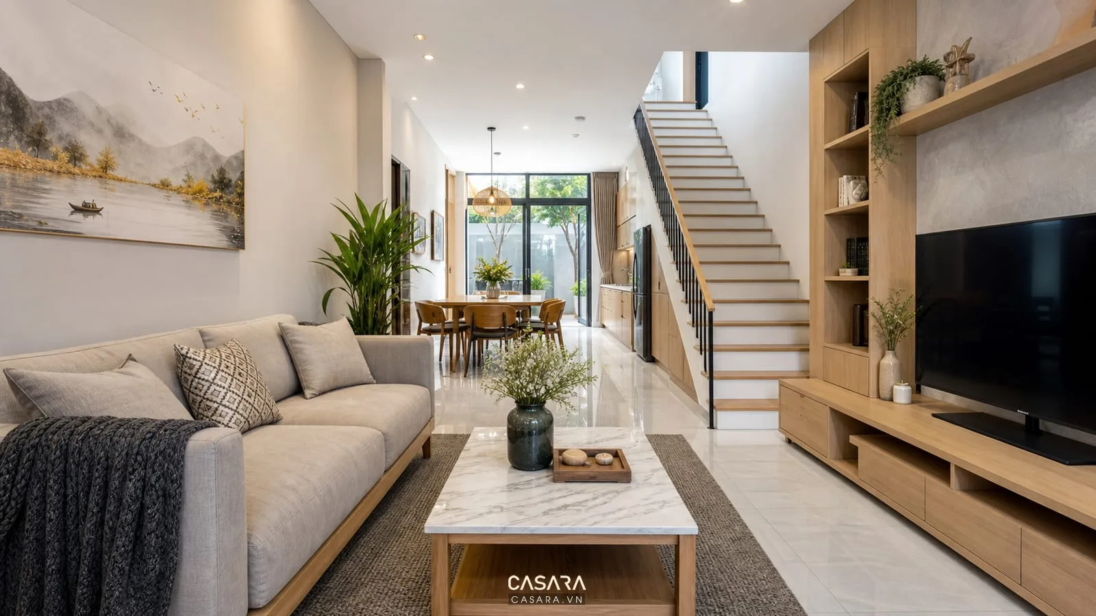 thiết kế nội thất nhà phố đẹp cho phòng khách hẹp ngang có sofa và kệ tivi