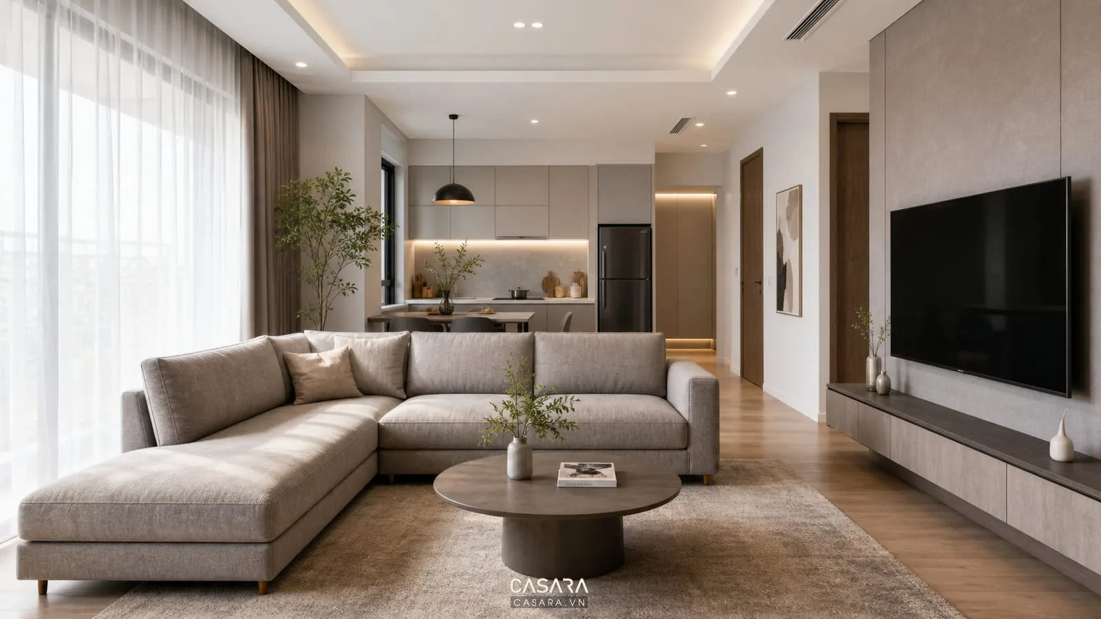 nội thất phòng khách hiện đại đẹp với sofa chữ L màu xám ấm bàn trà oval kệ tivi treo phẳng thảm lớn và rèm sáng