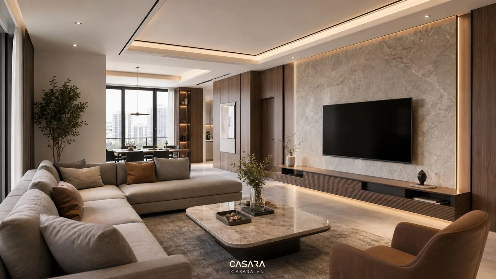 thiết kế căn hộ chung cư phòng khách liền bếp với sofa sáng màu và tủ gỗ âm tường hiện đại
