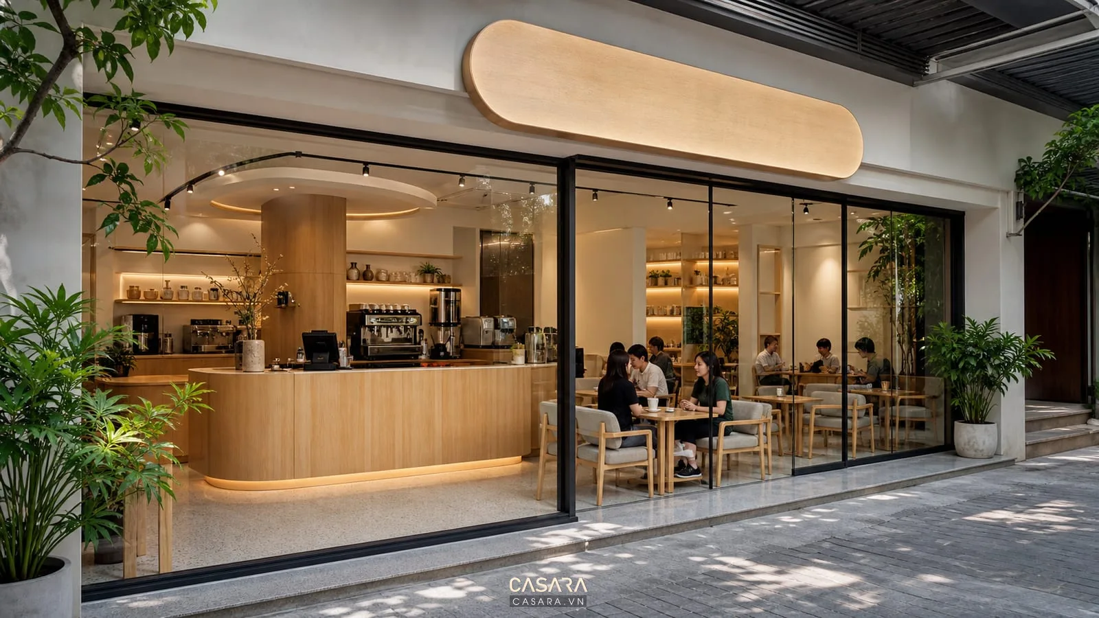 Mẫu thiết kế quán cafe đẹp với khu bàn nhóm bàn làm việc và góc thương hiệu