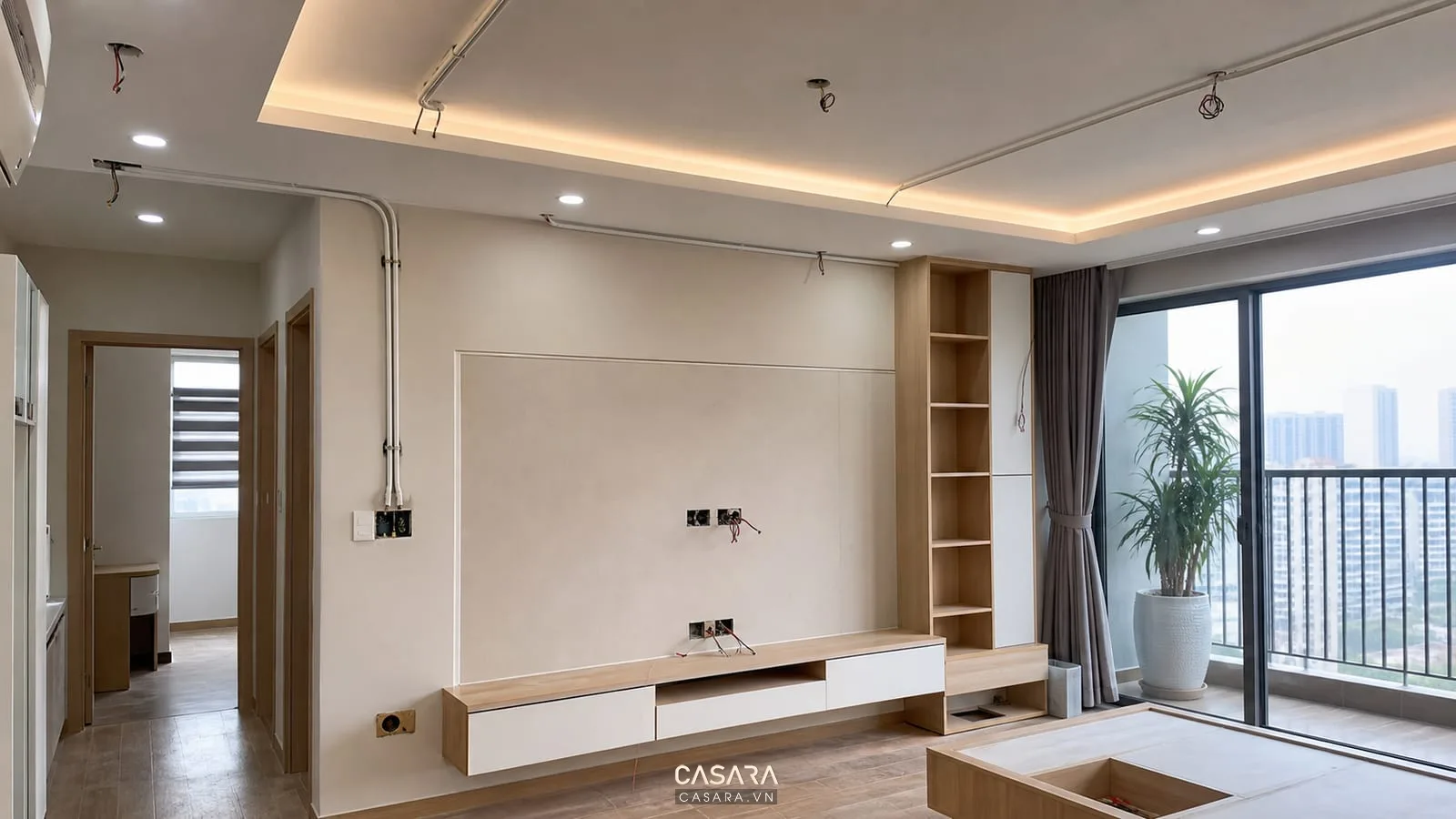 Thi công điện chung cư với hệ đèn âm trần và ổ cắm phòng khách căn hộ