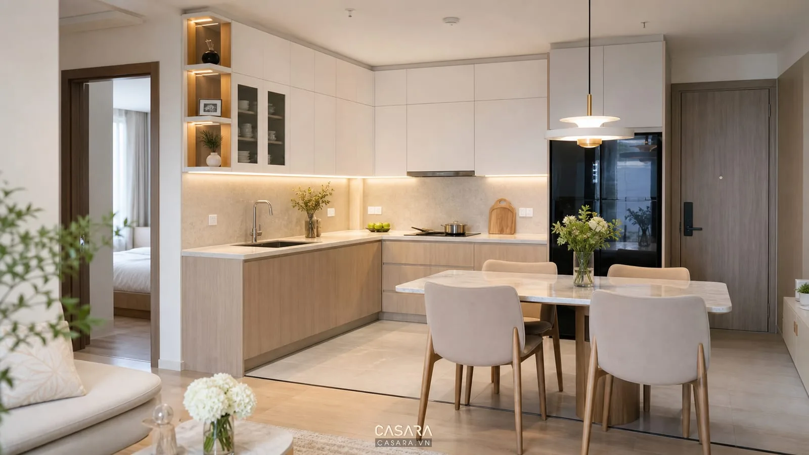 Thi công chung cư với tủ bếp chữ L và bàn ăn trong không gian mở