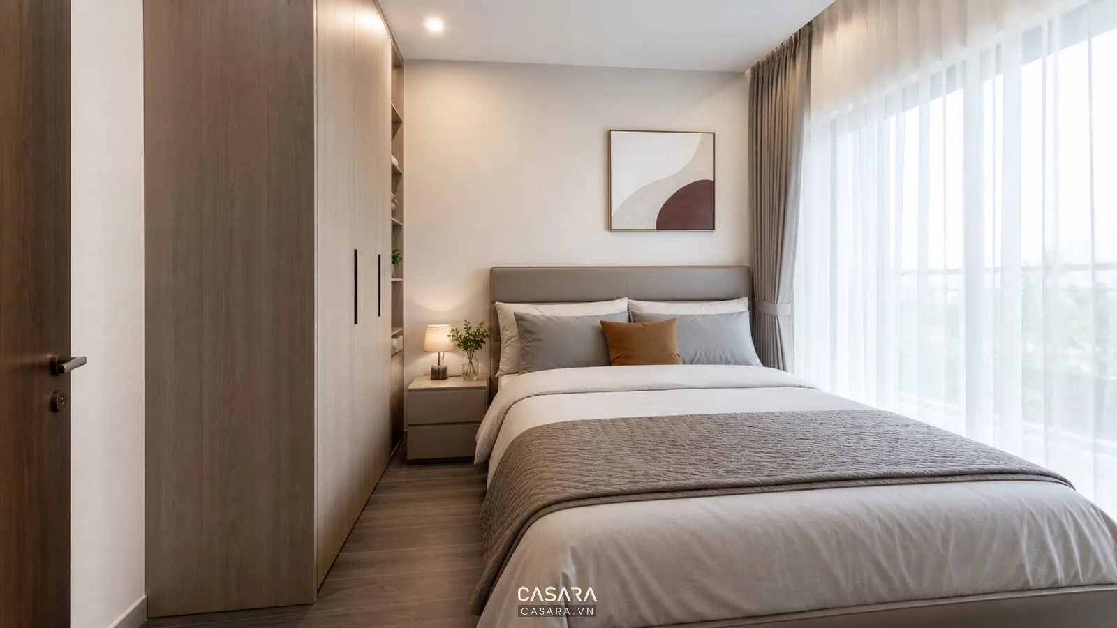 Phòng ngủ chung cư mini có giường đôi và tủ áo kịch trần