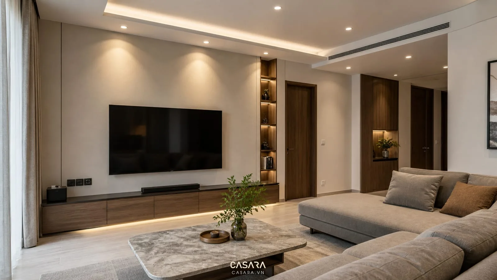 thi công kiến trúc phòng khách với đèn âm trần, ổ cắm tủ tivi và sofa hiện đại