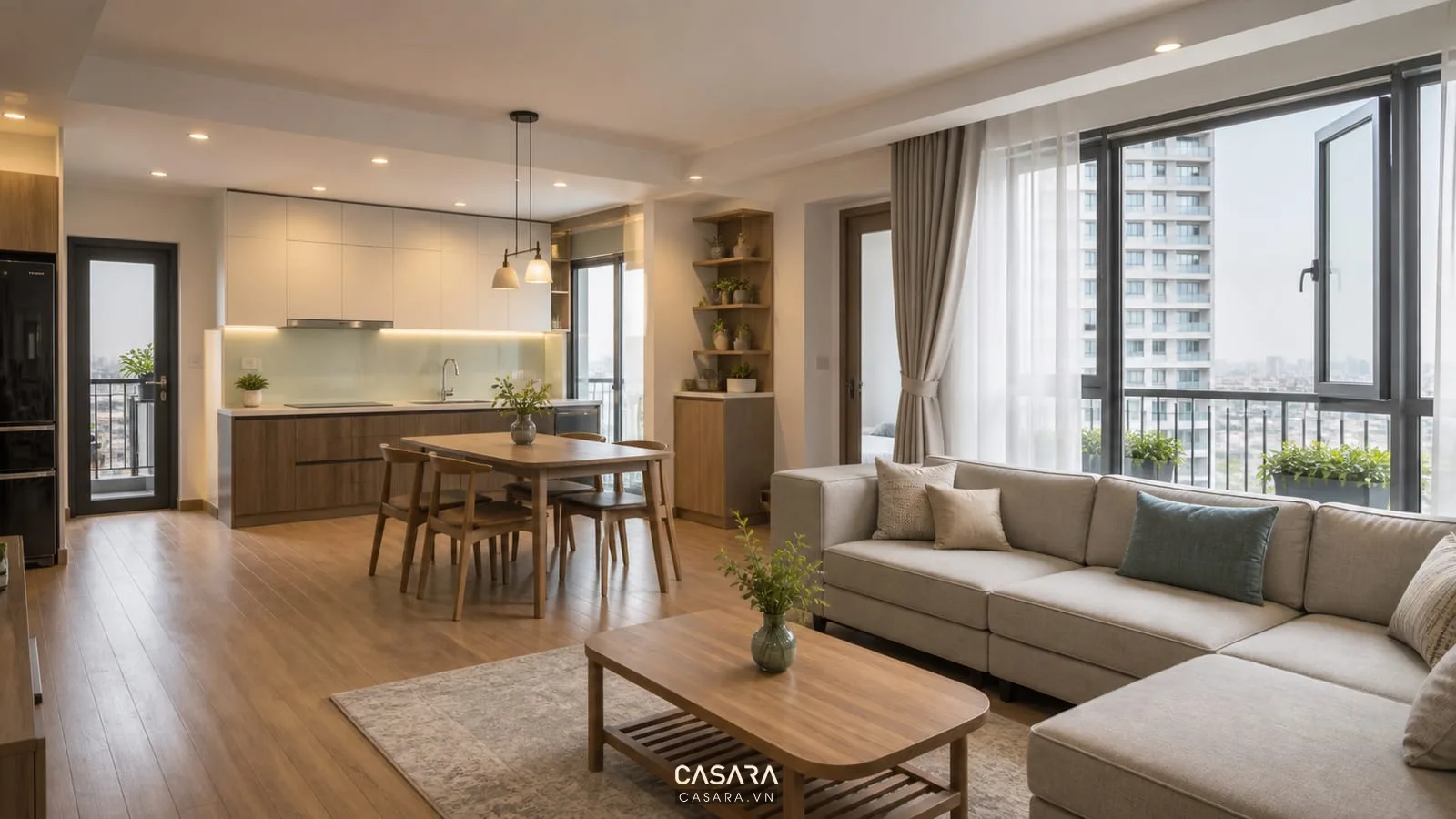Căn hộ chung cư sau thi công nội thất sạch sẽ với phòng khách bếp hoàn thiện và cửa sổ mở sáng