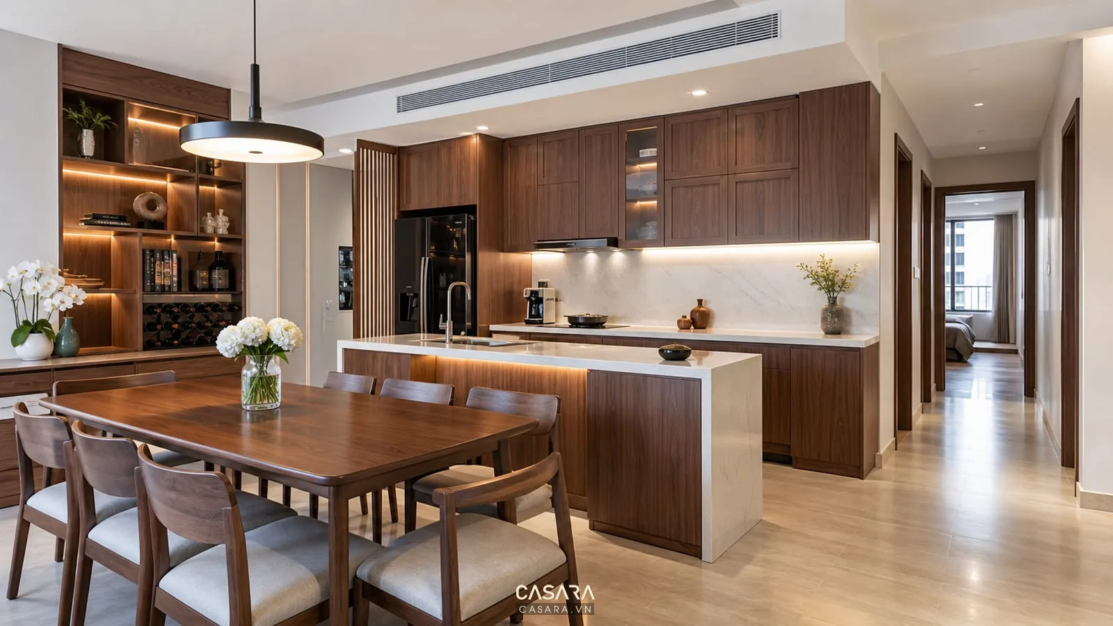 Thi công nội thất chung cư khu bếp và bàn ăn với tủ gỗ và mặt đá sáng