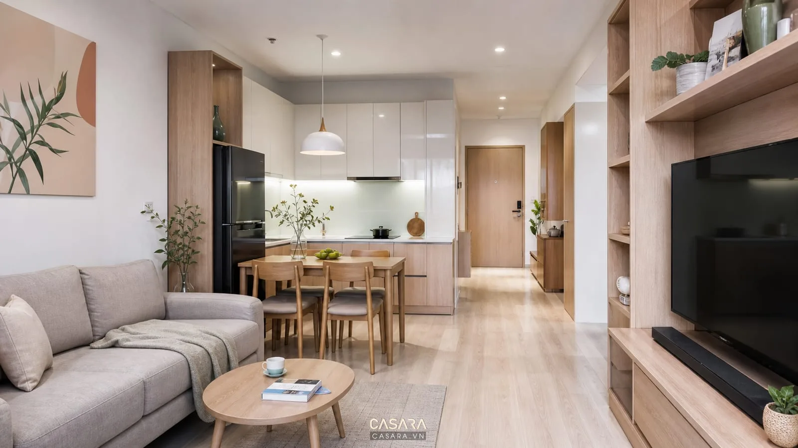 Thi công nội thất chung cư 70m2 với phòng khách bếp có sofa, bàn ăn, tủ bếp chữ L và kệ tivi gọn