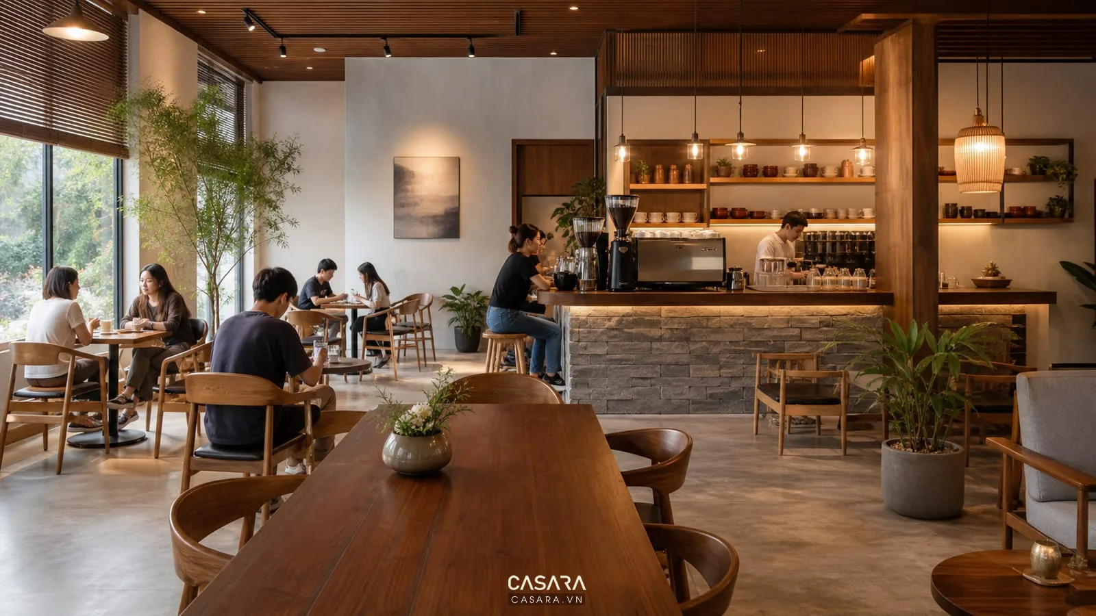 Thi công nội thất quán coffee với bàn ghế gỗ, quầy pha chế và ánh sáng ấm