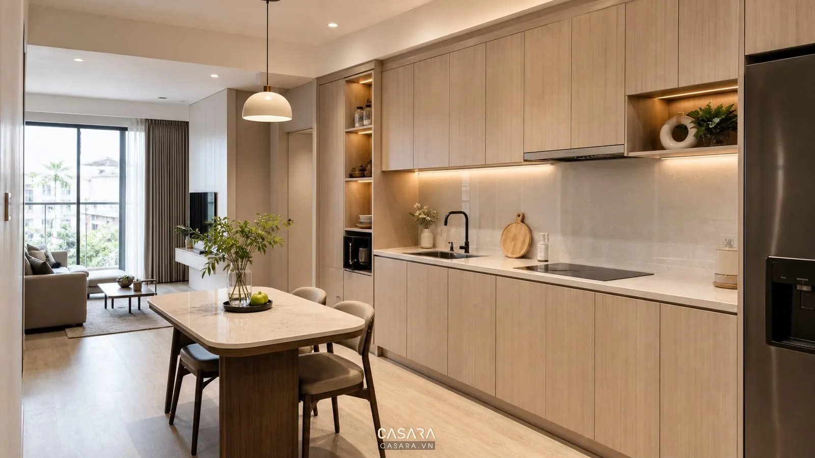 bếp mở trong thiết kế căn hộ 1 phòng ngủ có tủ bếp và bàn ăn nhỏ